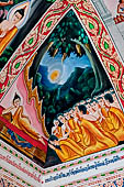 Vientiane, Laos - Pha That Luang, among the Other structures on the ground there is an open sala decorated with brightly colored paintings.  